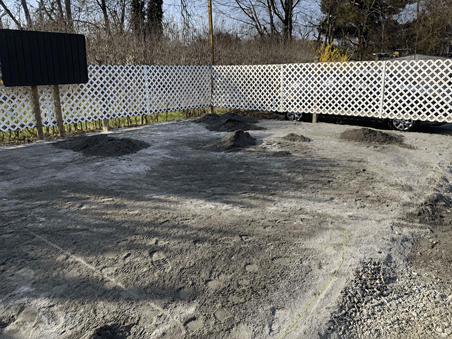 Cleared and graded dirt pad before the new patio was installed